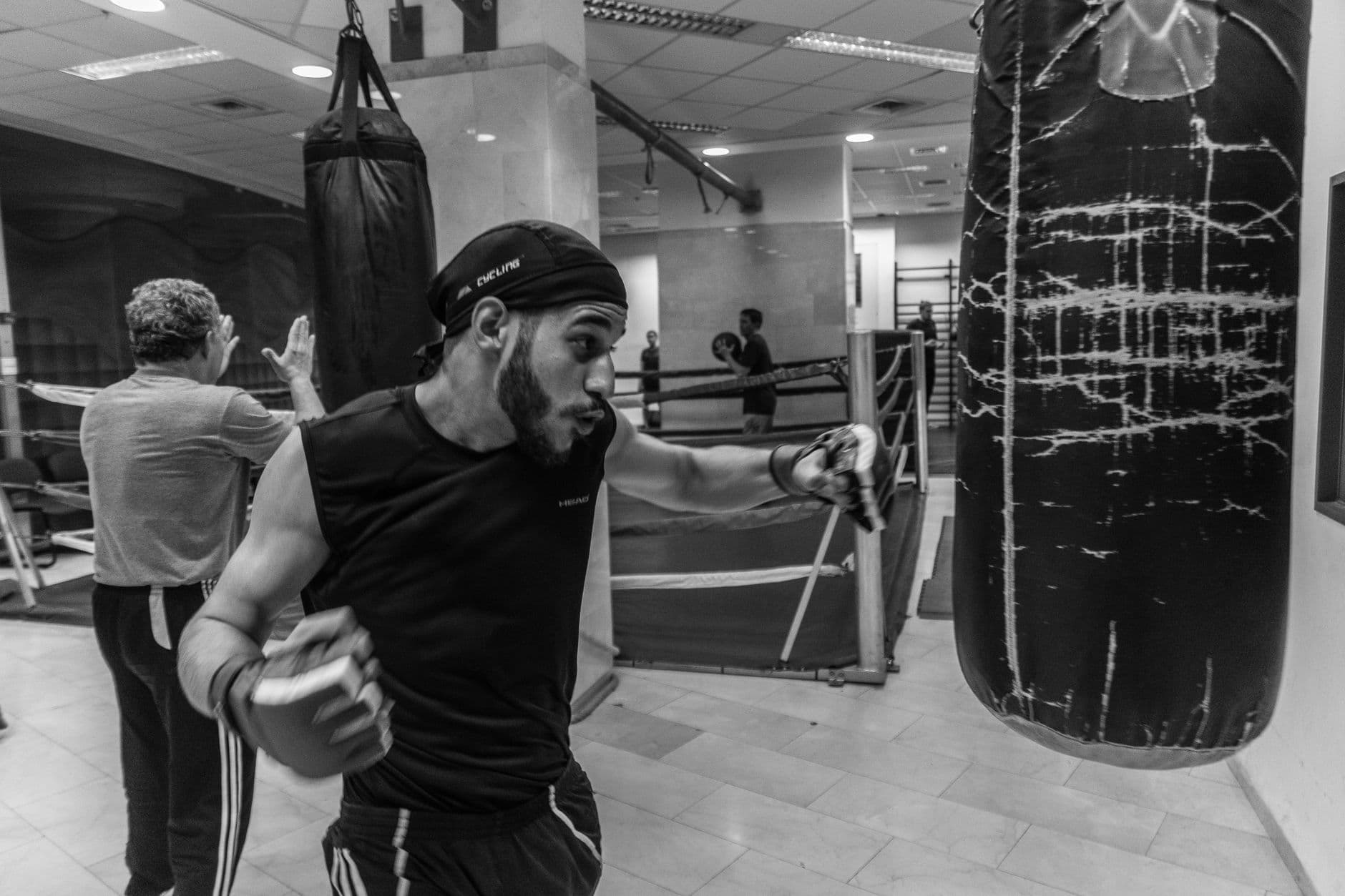 Bag work in a boxing gym