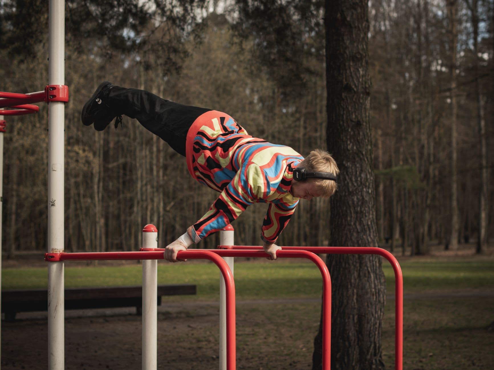 Calisthenics on outdoor parallel bars