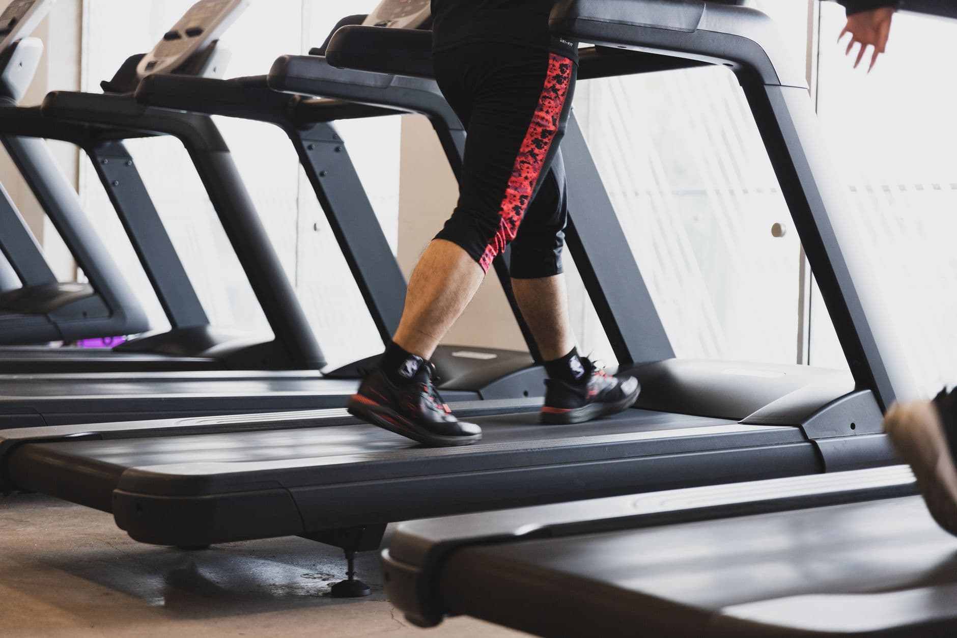 Walking on a treadmill in a gym