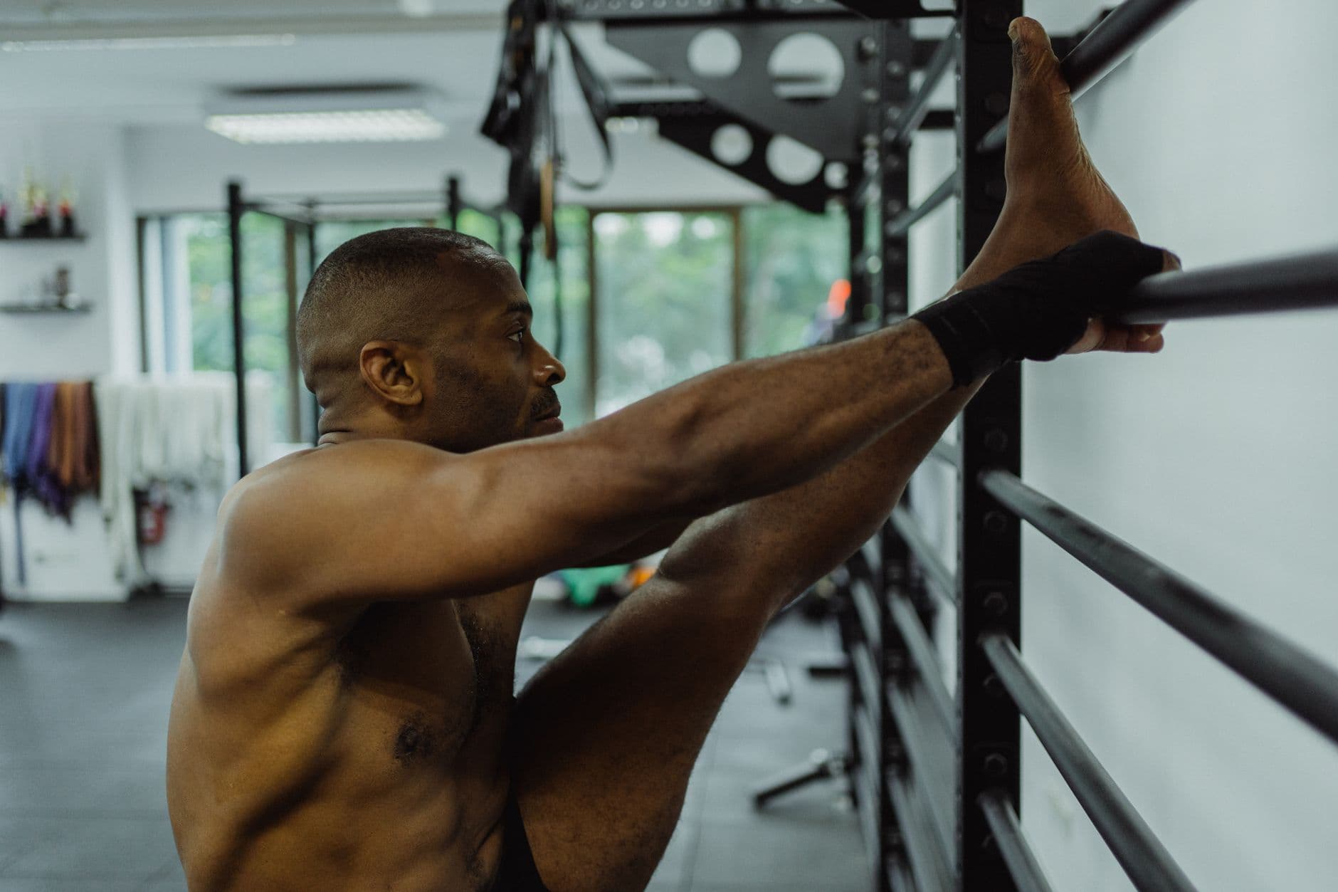 A straight-arm hold on wall bars